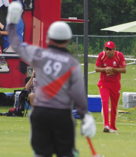 Jimmy Hansra catches Khurram Khan's drive at long on