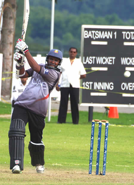 EHSN Silva, who took 3 for 37, drives an important and relieving boundary