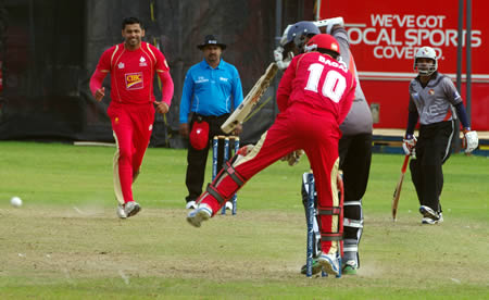 Rizwan Cheema (4-16) smiles as Silva is only able to defend