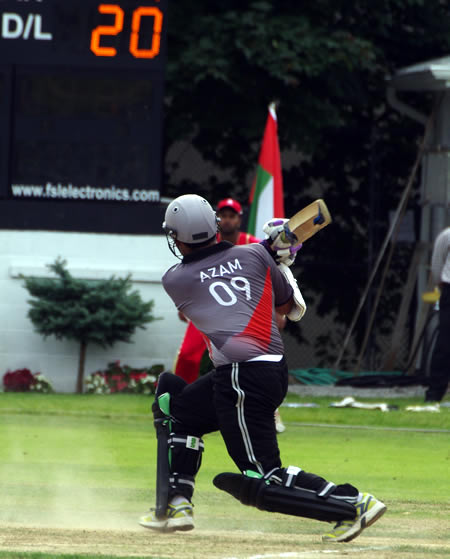 Mohammad Azam fires a six towards the scoredboard