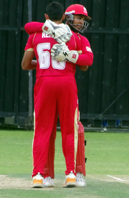 Ashish Bagai celebrates Swapnil Patil's lbw dismissal off Raza-ur-Rehman