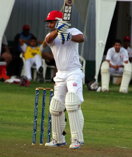 Ashish Bagai cuts the ball through point