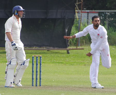 Raza-ur-Rehman bowling