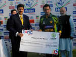 Skipper Mohammad Hafeez with the Player of the Match cheque