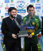 Skipper Mohammad Hafeez with the T20 series trophy