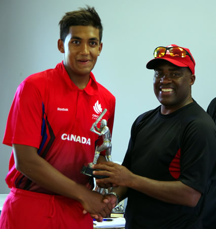 Nikhil Dutta (Canada) receives the Batsman of the Tournament Award