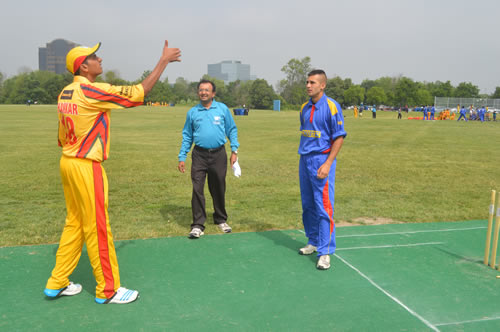  Harsh Thakkar (Ontario Greens) tosses the coin and Suliman Khan (British Columbia) makes the call