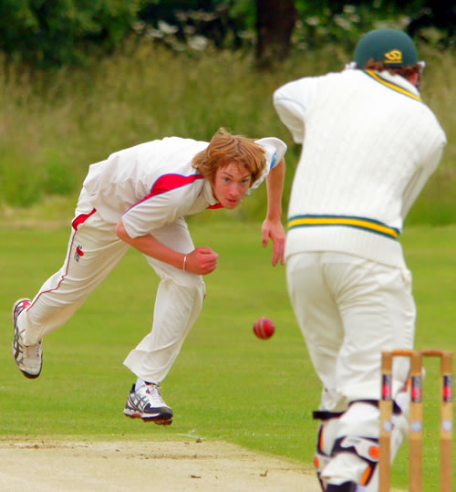 Another picture of Sam Thelwell opening the bowling for Swardeston