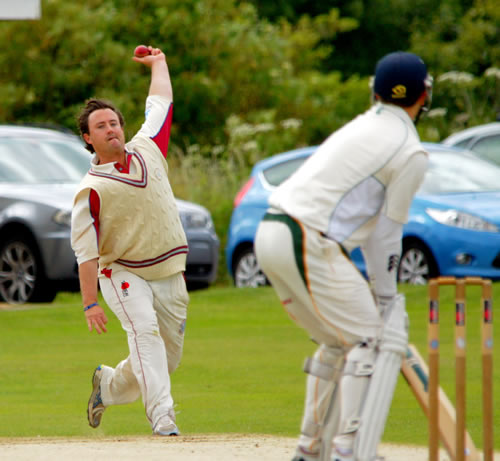 Another picture of George Walker bowling for Swardeston