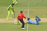 Dhawan gets run out off a throw by Misbah