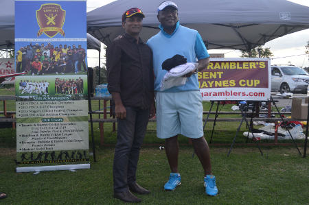 Discussions between Fayaz Jamkhandi (Mississauga Ramblers) and former West Indies international Desmond Haynes