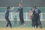 Scotland celebrate a wicket