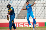 Avesh celebrates Avishka Fernando's wicket