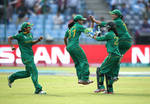 Pakistan players celebrate a wicket