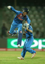 Sushma Verma of India celebrates the run out of Sana Mir