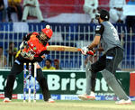 Sohail Tanvir misses the pull shot and is bowled