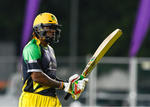 The batsman walks back after being dismissed