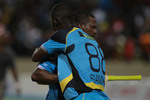 Darren Sammy embraces Johnson Charles