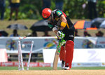 The batsman gets his stumps cleaned