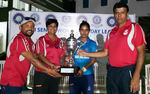 Mithali Raj and team management with the trophy