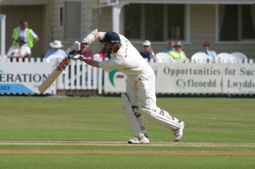 Nick Knight, the visiting captain, elegantly drives a ball for four