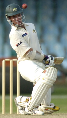 Brad Hodge avoids a ball