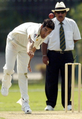 Umar Gul delivers the ball