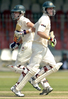 Cameron White and Michael Lewis running between the wickets