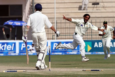 Shoaib Akhtar celebrates after taking a wicket