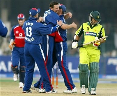 Steven Harmison celebrates with team after taking a wicket