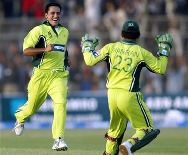 Yasir Arafat celebrates after taking Flintoff's wicket