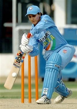 Monica Sumra plays a shot