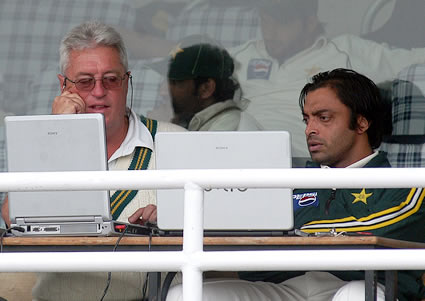 Bob Woolmer and Sohaib Akhtar watching live actions of match in laptop