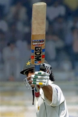 Younis Khan raises his bat to the crowd