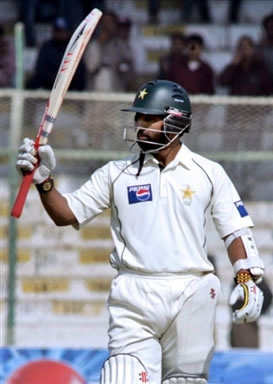 Yousuf raises his bat to the crowd