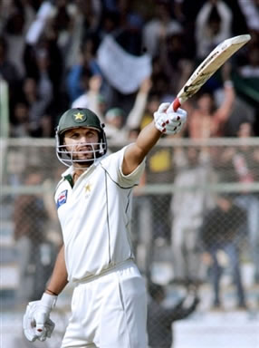 Afridi waves his bat to the crowd