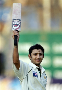 Faisal Iqbal celebrates after scoring a century