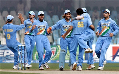 Indian players celebrates the dismissal of Salman Butt