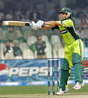 Kamran Akmal plays a shot