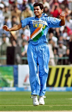 RP Singh celebrates after taking the wicket