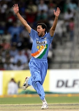 Ajit Agarkar celebrates the dismissal of Younis Khan