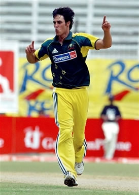 Johnson celebrates after taking a wicket