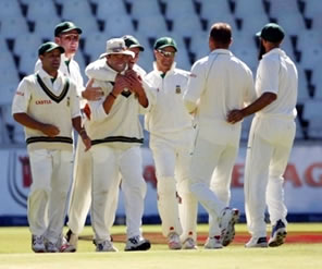 South African team celebrates after taking a wicket