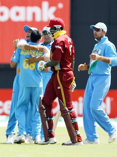 India team celebrate Gayle's dismissal