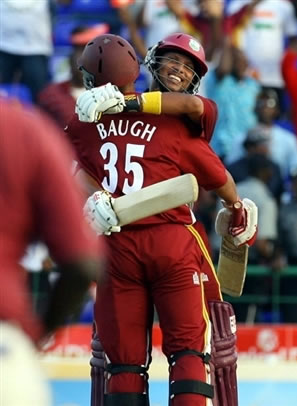 Sarwan celebrates with Baugh after hitting the match-winning shot